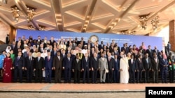 Leaders from the Non-Aligned Movement pose for a family photograph at the 19th summit, in Munyonyo suburb, of Kampala, Uganda January 19, 2024.