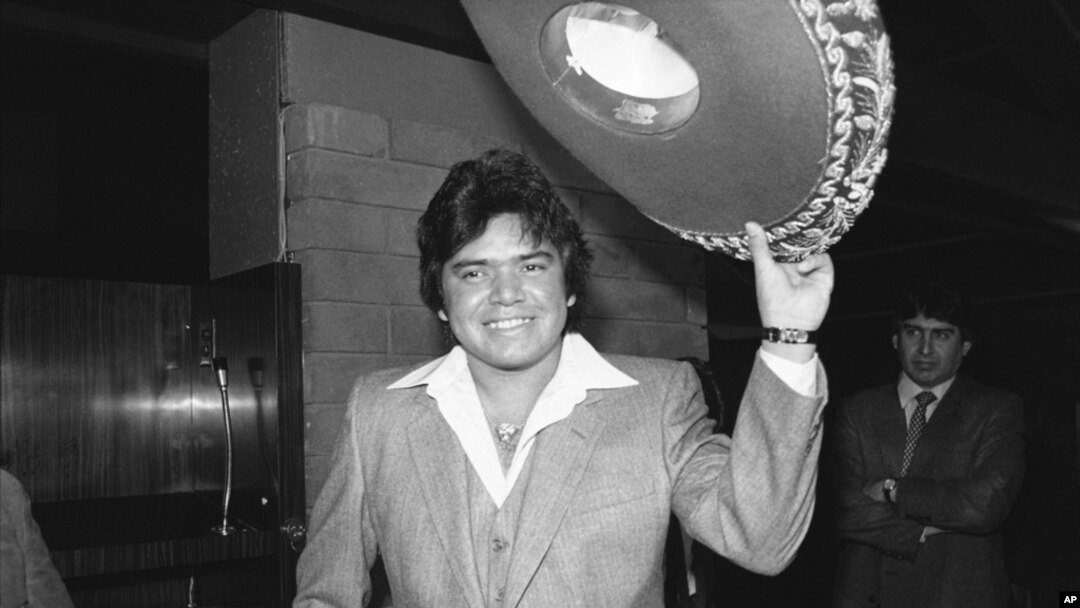 FILE - Los Angeles Dodger pitcher Fernando Valenzuela tips his sombrero at a news conference after he was named National League Rookie of the Year, in Los Angeles, Dec. 2, 1981.