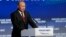 Владимир Путин (слева)