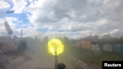 Постріл з броньованої машини Російського добровольчого корпусу, 13 травня 2024 року. Фото РДК, поширене Reuters