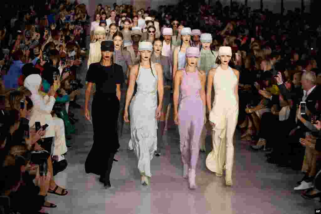 Models present a creations during the Max Mara Spring-Summer 2020 collection, in Milan fashion week, in Italy.