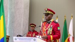 FILE - Gabon coup leader General Brice Oligui Nguema speaks after being sworn in as interim president during his swearing-in ceremony, in Libreville, Gabon, September 4, 2023.