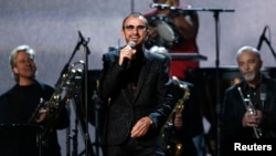 FILE - Ringo Starr performs "Photograph" at the 56th annual Grammy Awards in Los Angeles, Jan. 26, 2014. 