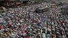 Bangladeshi Muslim devotees offer prayers during the first day of Islamic congregation Tablighi Jamaat’s second phase of Bishwa Ijtema in Tongi, 20 kilometers (13 miles) north of Dhaka, Bangladesh, Jan. 15, 2016. 