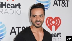 Luis Fonsi attends the iHeartRadio Summer Pool Party at the Fontainebleau Miami Beach, June 9, 2017, in Miami Beach, Fla. 