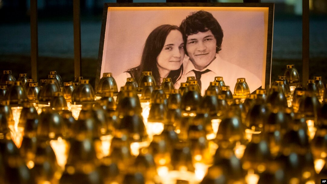 A memorial in Bratislava, Slovakia, for murdered journalist Jan Kuciak and his girlfriend, Martina Kusnirova, is seen in this Feb. 28, 2018, photo.