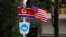 FILE - Flags of North Korea and the U.S are flown on a street in Hanoi, Vietnam, Feb. 19, 2019.