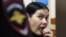 Gyulchekhra Bobokulova, a nanny suspected of killing a young girl in her care, reacts inside a defendants' cage during a court hearing in Moscow, March 2, 2016. Prosecutors argue Bobokulova is mentally unstable.