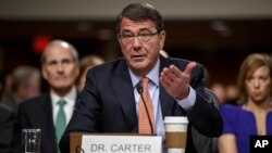 Ashton Carter, President Barack Obama’s choice to be defense secretary, testifies before the Senate Armed Services Committee hearing on his nomination to replace Chuck Hagel as Pentagon chief, on Capitol Hill, Washington, Feb. 4, 2015.