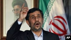 Iranian President Mahmoud Ahmadinejad, addresses a speech during a rally organized by Hezbollah in the southern border town of Bint Jbeil, Lebanon, 14 Oct 2010