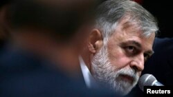 Former director of Brazil's state-run Petrobras oil company, Paulo Roberto Costa, reacts during a congressional committee that is investigating allegations of corruption at Brazilian state-run oil company Petroleo Brasileiro SA, in Brasilia, Dec. 2, 2014.