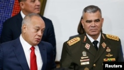 El ministro del Interior de Venezuela, Diosdado Cabello, y el ministro de Defensa, Vladimir Padrino, asisten a una sesión con legisladores de la Asamblea Nacional para la aprobación del presupuesto de 2025, en Caracas, Venezuela, el 3 de diciembre de 2024.