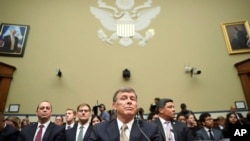 Acting Director of National Intelligence Joseph Maguire takes his seat before testifying before the House Intelligence Committee on Capitol Hill in Washington, Thursday, Sept. 26, 2019.