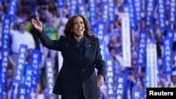 "Je promets d'être la présidente de tous les Américains", a dit la vice-présidente Kamala Harris.