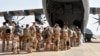The last French soldiers board a military plane to leave Niger for good, at the French base that was handed over to the Nigerien army, in Niamey on Dec. 22, 2023.