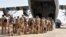 The last French soldiers board a military plane to leave Niger for good, at the French base that was handed over to the Nigerien army, in Niamey on Dec. 22, 2023.