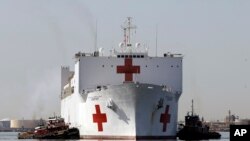 FILE - The Navy hospital ship USNS Comfort returns to port in Baltimore, March 19, 2010.