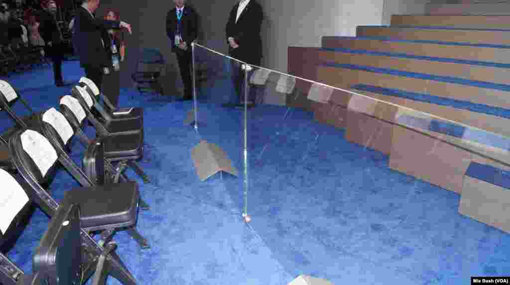 An acrylic partition prevents access to the stairs to the main stage at the Democratic National Convention, at the Wells Fargo Arena in Philadelphia, July 26, 2016.