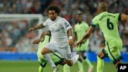 Marcelo en action lors d'un match con Manchester City, Espagne, le 4 mai 2016