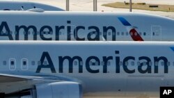 Pesawat American Airlines di bandara International Miami. (Foto: ilustrasi)