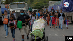 Foto de archivo de la primera caravana de migrantes de 2021, realizada a inicios de enero y compuesta por miles de habitantes de países del Triángulo Norte de Centroamérica y México.