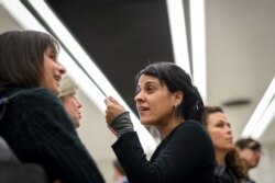 FILE - Swiss exiled pro-independence former member of the Catalan parliament Anna Gabriel gestures after a side event of the United Nations Human Rights Council in Geneva, March 19, 2018.