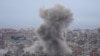 Smoke rises between buildings hit in a Israeli airstrike in Dahiyeh, in the southern suburb of Beirut, Lebanon, Nov. 17, 2024. 