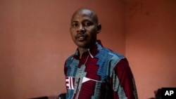 FILE - Daouda Diallo, one of Burkina Faso's most prominent human rights defenders, poses for a photograph in Ouagadougou, Burkina Faso, on Feb. 3, 2022. Diallo was taken to an unknown location by men who accosted him in Ouagadougou on Dec. 1, 2023, rights groups say.