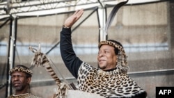 FILE - Zulu King Goodwill Zwelithini greets his supporters at The Moses Mabhida Football Stadium in Durban, South Africa, Oct. 7, 2018.