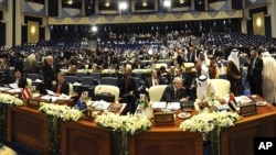 Delegates from 60 nations gathered in Kuwait to consider increased pledges for U.N. humanitarian aid for more than five million civilian victims of the Syria conflict, January 30, 2013. 