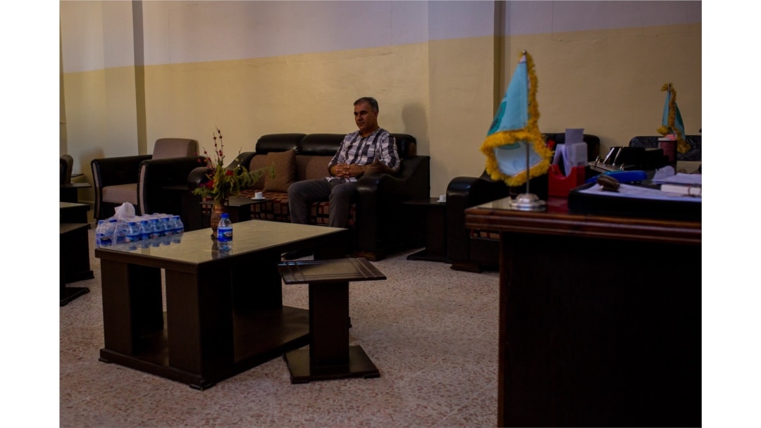 The speaker of Raqqa’s Parliament, Khalid Borkal, says ISIS members and sleeper cells are still operating in Raqqa, Syria, Aug. 25, 2019. (Yan Boechat/VOA)