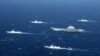 FILE - This photo taken Jan. 2, 2017, shows a Chinese navy formation during military drills in the South China Sea. 