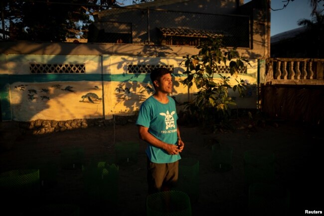 Carlos Tamayo, 44, operations director of sea turtle conservation effort CURMA, is photographed at their hatchery in San Juan, La Union, Philippines, December 20, 2022. (REUTERS/Eloisa Lopez)