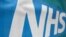 An NHS logo is displayed outside a hospital in London, Britain, May 14, 2017. 