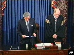 FILE - Senate chaplain Rev. Lloyd Ogilvie gives the final prayer of the impeachment trial and offers thanks for the tenor of the debate and asked for healing for President Clinton and his family on the Senate floor, Feb. 12, 1999.