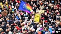 Protesters crowd Roemer Square during a demonstration against racism and far-right politics in Frankfurt, Germany, on Jan. 20, 2024.