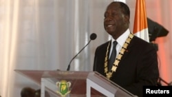 Ivory Coast President Alassane Ouattara speaks during his inauguration ceremony at the Presidential Palace in Abidjan, Ivory Coast, Nov. 3, 2015.