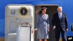 US President Donald Trump and his wife Melania arrive at Melsbroek Military Airport in Melsbroek, Belgium on May 24, 2017. 