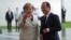 German Chancellor Angela Merkel welcomes French President Francois Hollande at the chancellery in Berlin, Germany, May 15, 2012. 