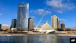 FILE - Milwaukee's skyline is seen along Lake Michigan, Feb. 8, 2019. Democrats selected the Wisconsin city to host their 2020 national convention at which the party's standard-bearer will accept the presidential nomination.