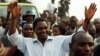 Hakainde Hichilema, United Democratic Alliance (UDA) leader and presidential candidate for Zambia's upcoming elections, greets his supporters at Zingalume compound in Lusaka.