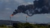 FILE - Flare stacks release gases at the Jose Antonio Anzoategui oil complex in Barcelona, Venezuela, Jan. 9, 2024. 