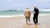 Israel's Prime Minister Benjamin Netanyahu (R) walks with India's Prime Minister Narendra Modi as they visit Olga Beach and a water desalination unit operated by G.A.L. Water Technologies, near Hadera, Israel, July 6, 2017.