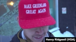 Hans Louis Petersen, a 20-year-old student in Nuuk, wears a “Make Greenland Great Again” hat. He welcomes U.S. President Donald Trump’s interest in Greenland.