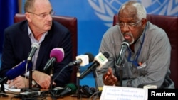 David Shearer, left, head of the U.N. Mission in South Sudan (UNMISS), and UNMISS Human Rights Director Eugene Nindorera address a news conference in Juba, South Sudan, Feb. 22, 2018.