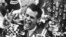 FILE - In this May 24, 1981, photo, Bobby Unser holds three fingers aloft after winning his third Indianapolis 500 auto race ,in Indianapolis, Ind.