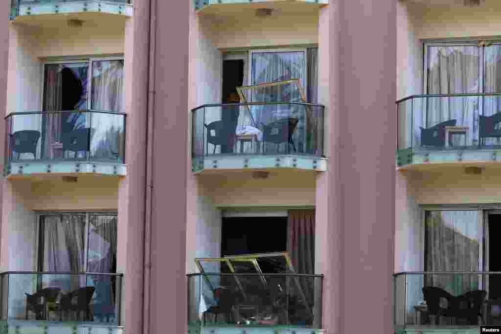 Broken windows are seen in a hotel following a blast in a military ammunition depot near the town of Kyrenia in northern Cyprus.