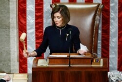 House Speaker Nancy Pelosi strikes the gavel after announcing the passage of the second article of impeachment against President Donald Trump, Dec. 18, 2019, on Capitol Hill in Washington.