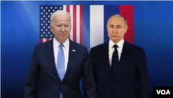 Joe Biden, as US President, and Vladimir Putin, as Russia president (l-r), over US and Russian flags, on texture, partial graphic