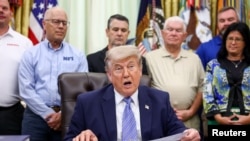 U.S. President Trump and EPA Administrator Zeldin make an announcement at the White House